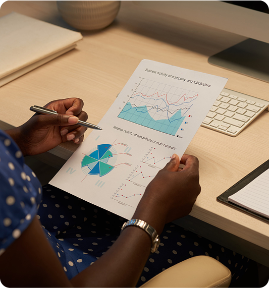 Person analyzing charts